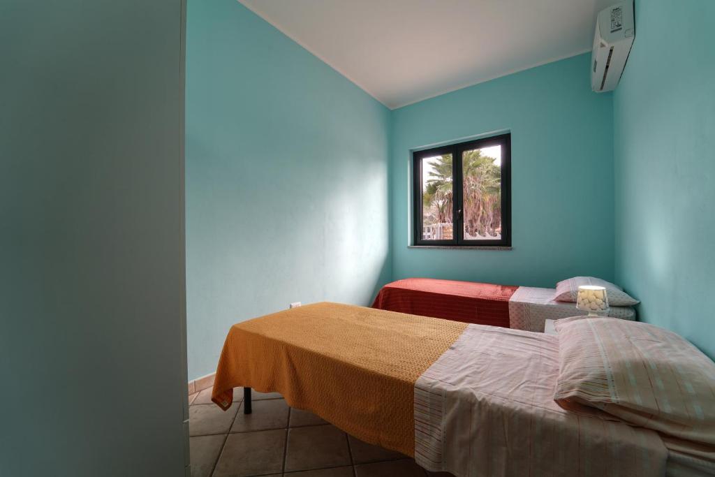 casa vacanze margherita - Appartamento Con Due Camere Da Letto Con Balcone