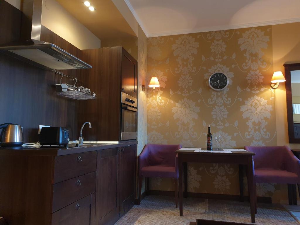 Kuchyň nebo kuchyňský kout v ubytování Sunny Beach - Royal Beach Apartment