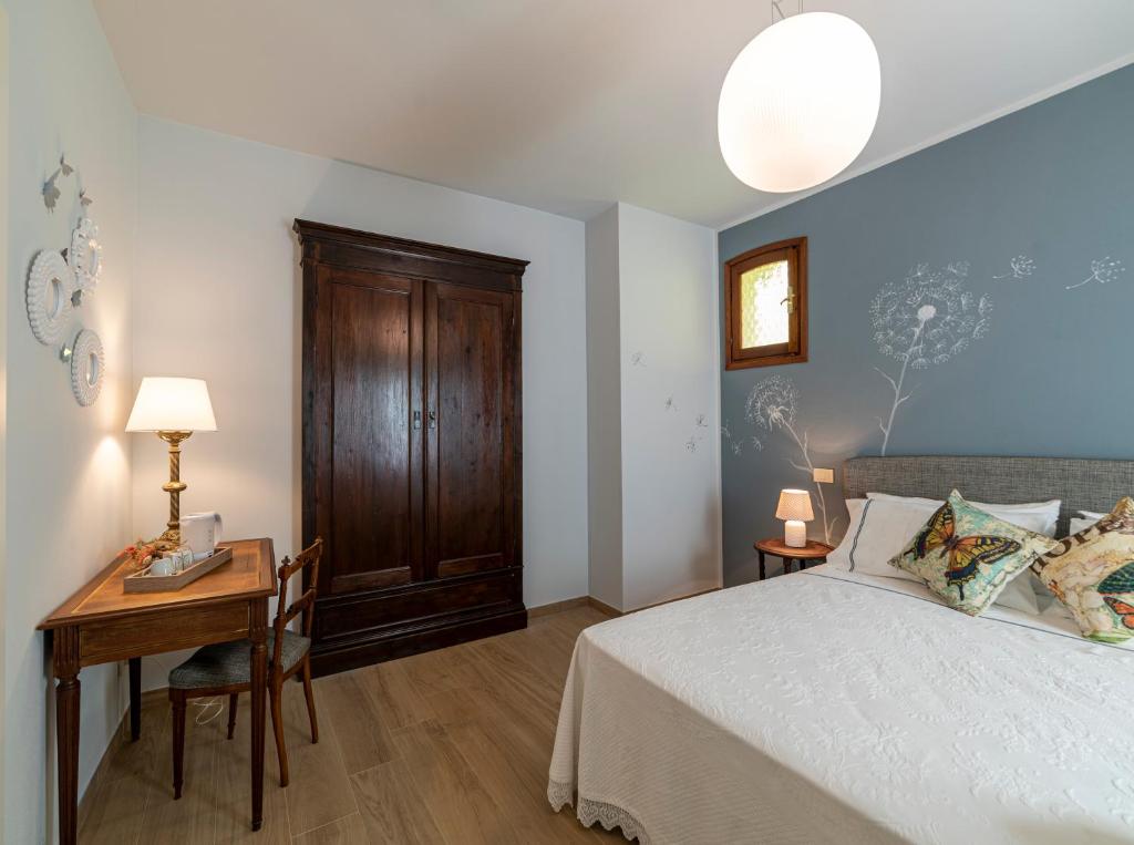 Postel nebo postele na pokoji v ubytování Agriturismo dalla Mimmi