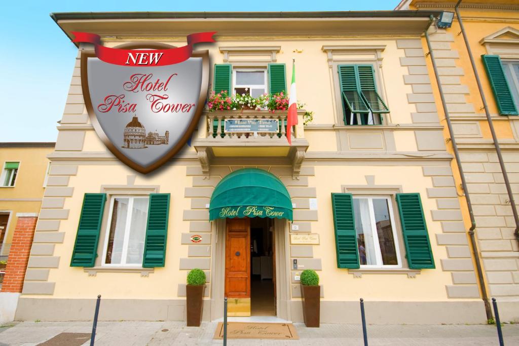 a newitz gin center sign in front of a building at Hotel Pisa Tower in Pisa