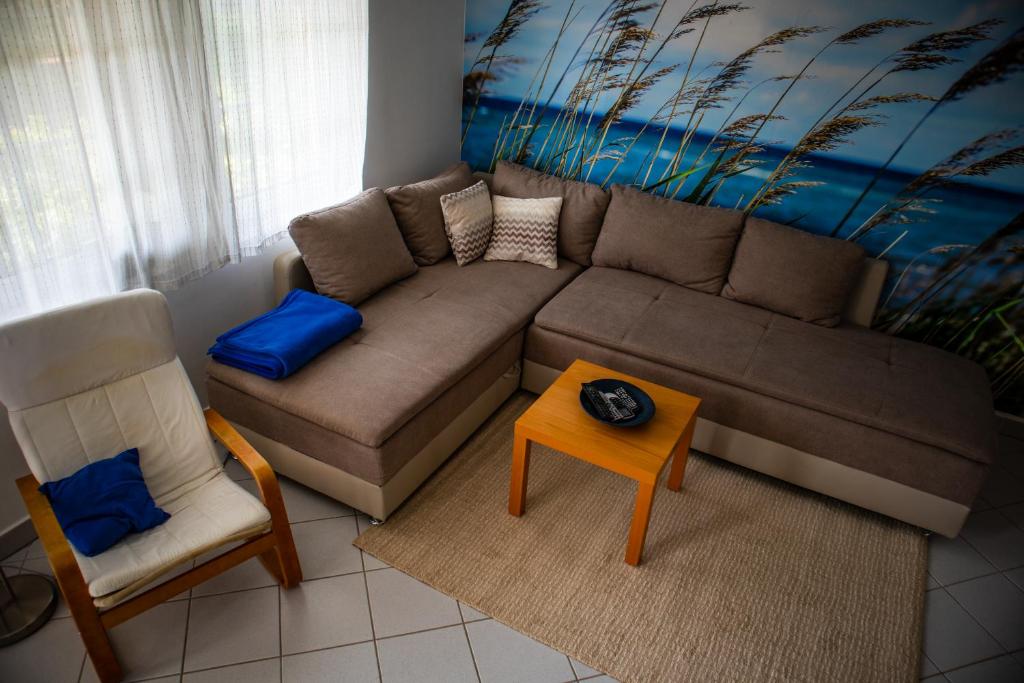 Posezení v ubytování Nefelejcs Apartmanház