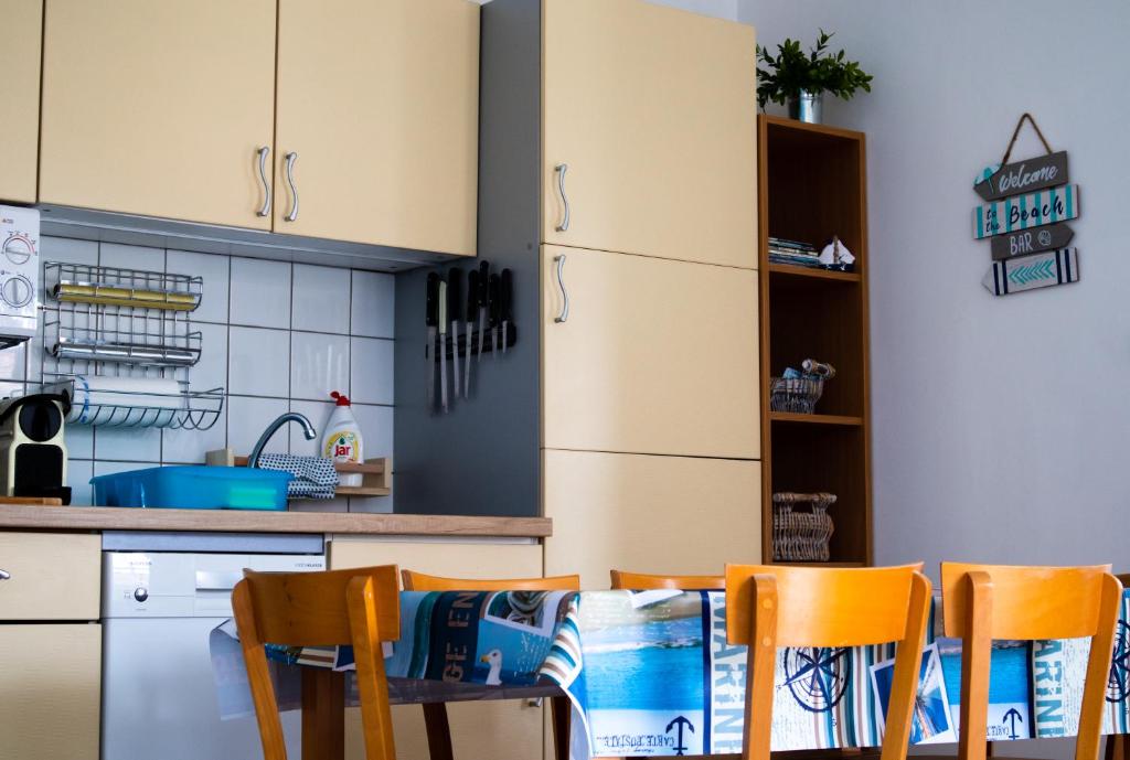 Kuchyň nebo kuchyňský kout v ubytování Nefelejcs Apartmanház