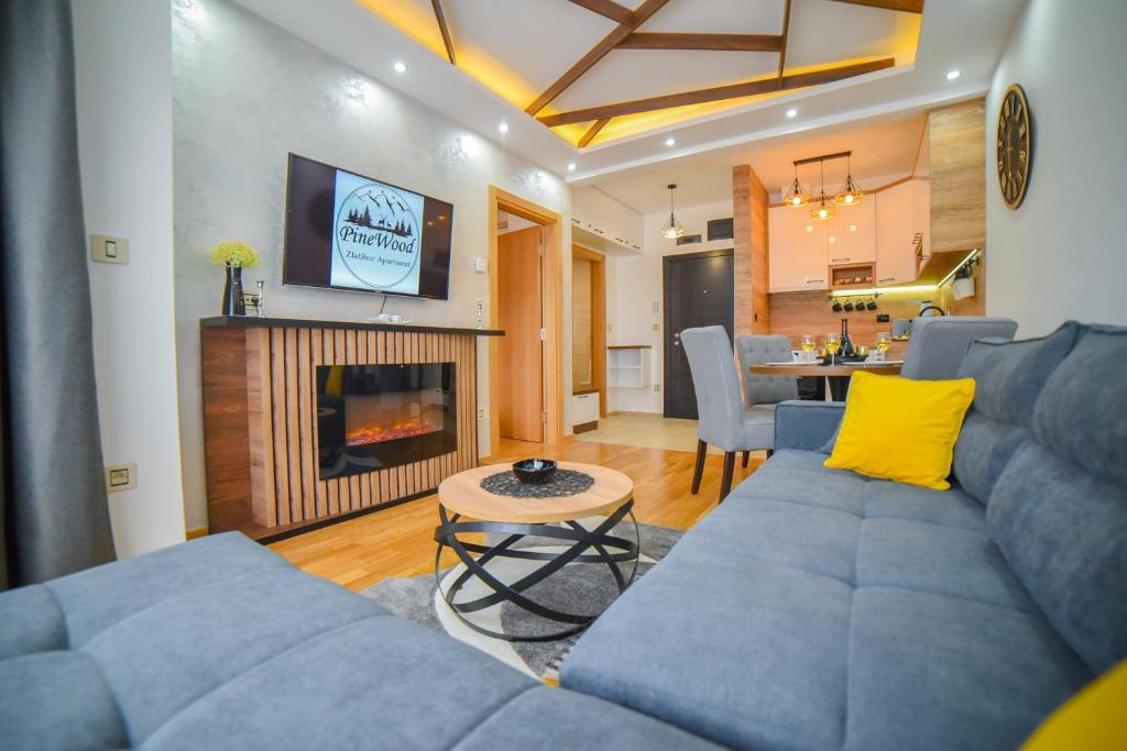 Posezení v ubytování PineWood Apartman Zlatibor