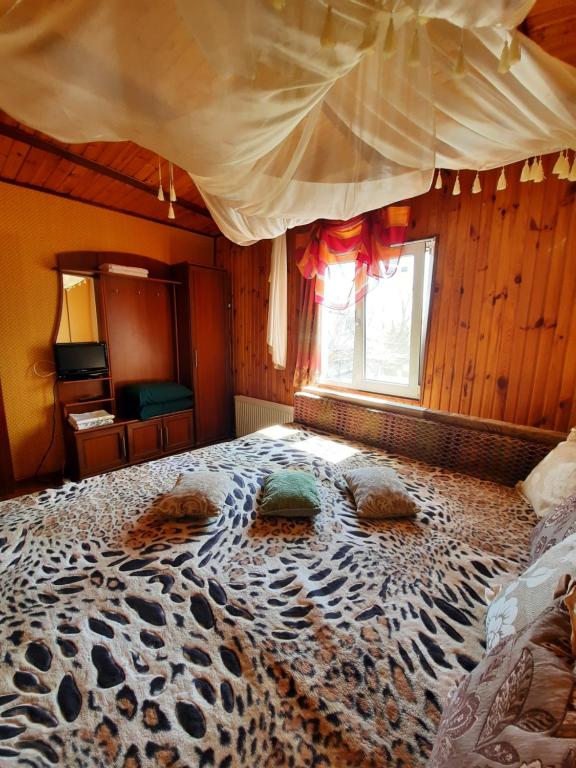 Postel nebo postele na pokoji v ubytování Kitech Guest House