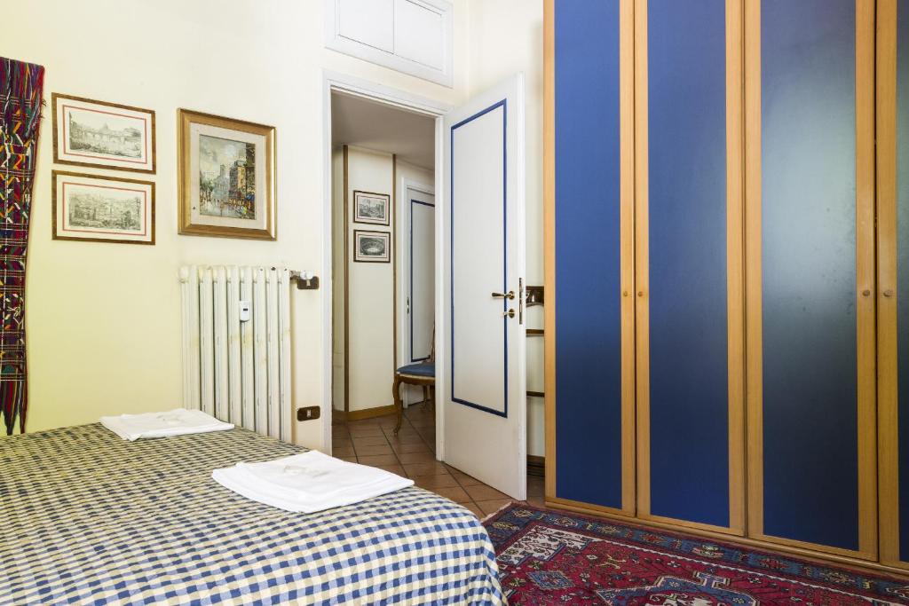 Posteľ alebo postele v izbe v ubytovaní Lemon Tree Apartment Sistine Chapel