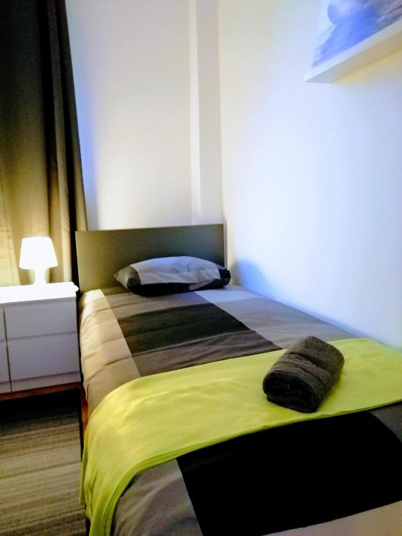Posteľ alebo postele v izbe v ubytovaní Pula Center Arena Belvedere Apartments and Rooms