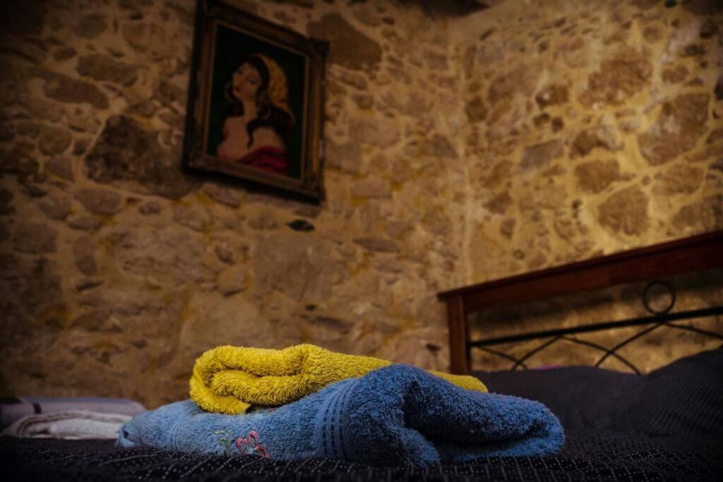 A bed or beds in a room at The Royal Stonehouse : Sophia