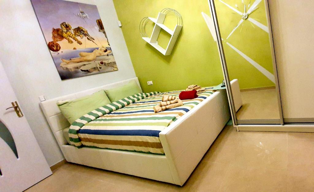 a small childs bedroom with a bed in a room at Apollo 1 - Luxury Apartment in Katerini