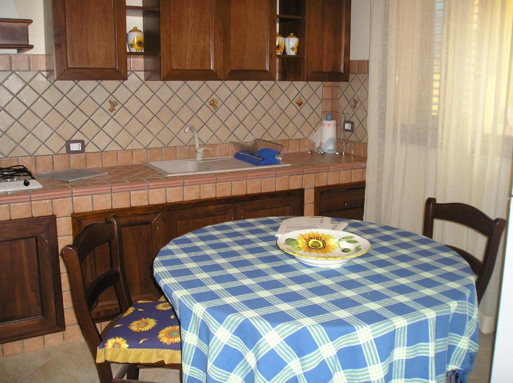 Kuchyň nebo kuchyňský kout v ubytování Puesta De Sol Residence