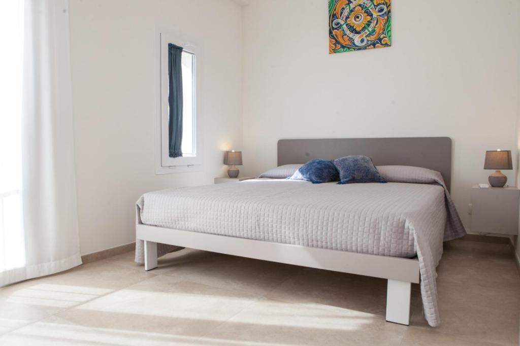 Postel nebo postele na pokoji v ubytování Candelieri19