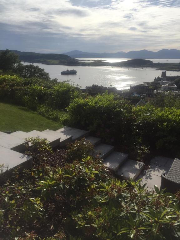 a view of a body of water with a boat in it at Tigh Beag in Oban