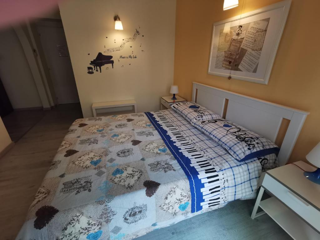 A bed or beds in a room at Il Pianoforte B&B