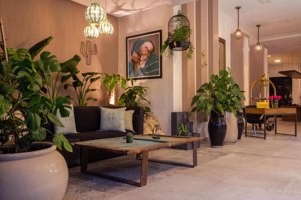 Posezení v ubytování Dellarosa Boutique Hotel and Spa