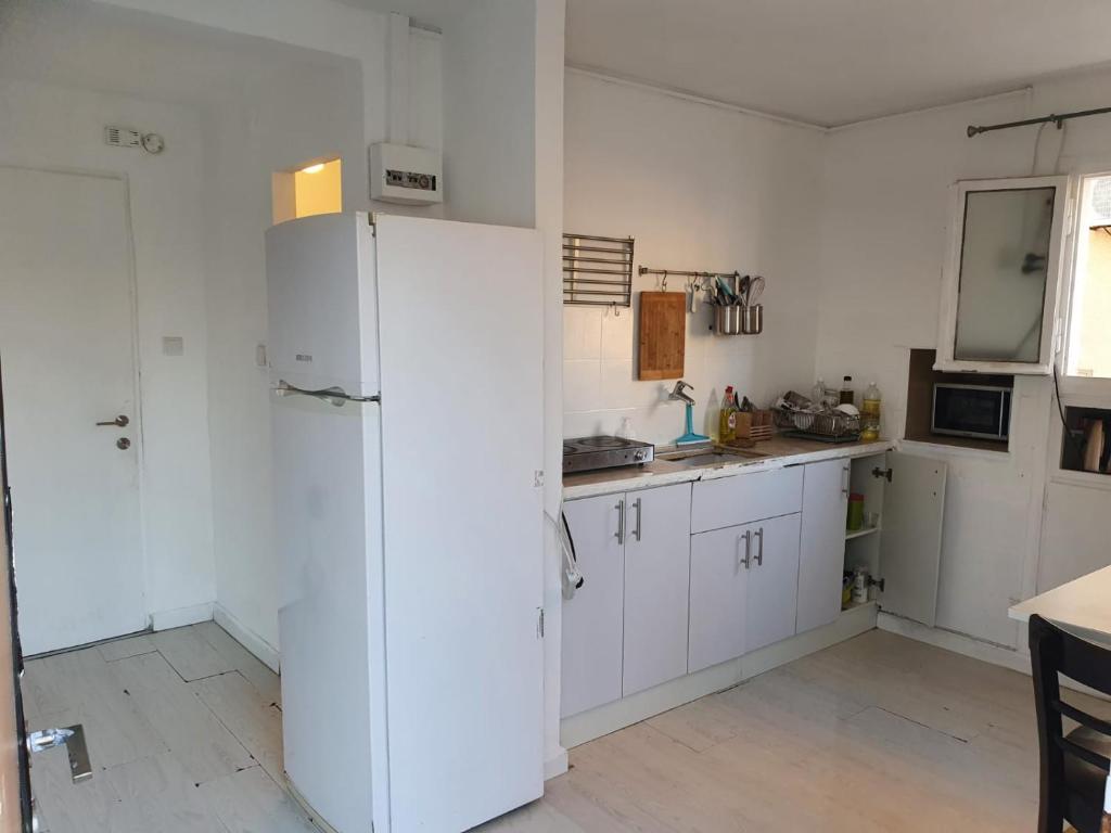 Kuchyň nebo kuchyňský kout v ubytování Hostel BU93