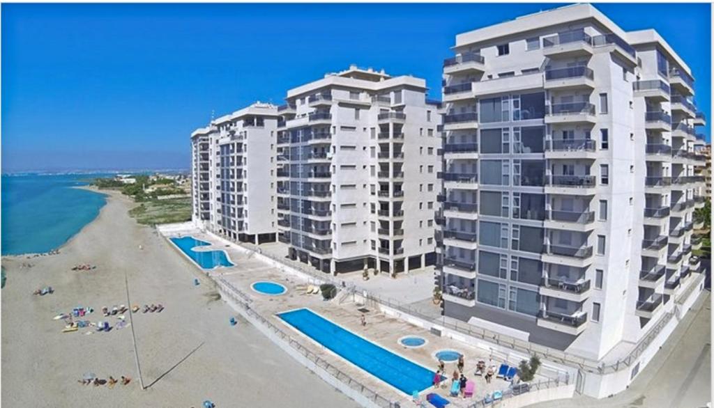 an aerial view of two large condos on a beach at La Manga Beach Club LMHA 03 in Murcia