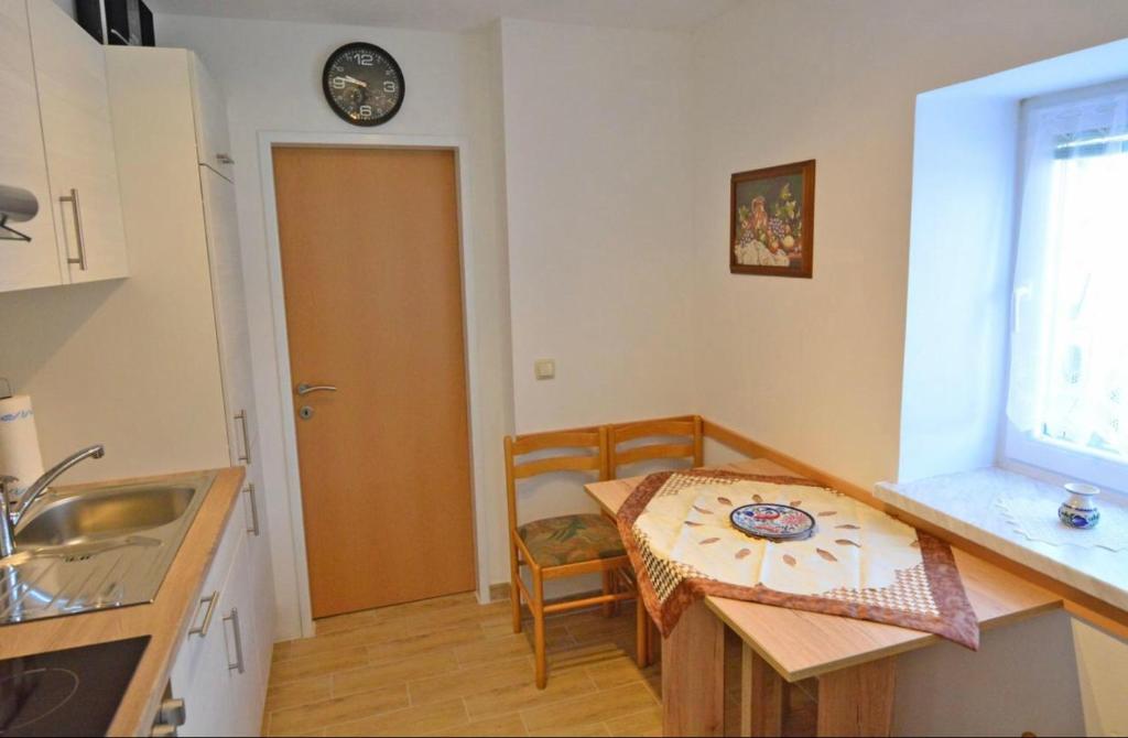 Kuchyň nebo kuchyňský kout v ubytování Appartement Gombotz