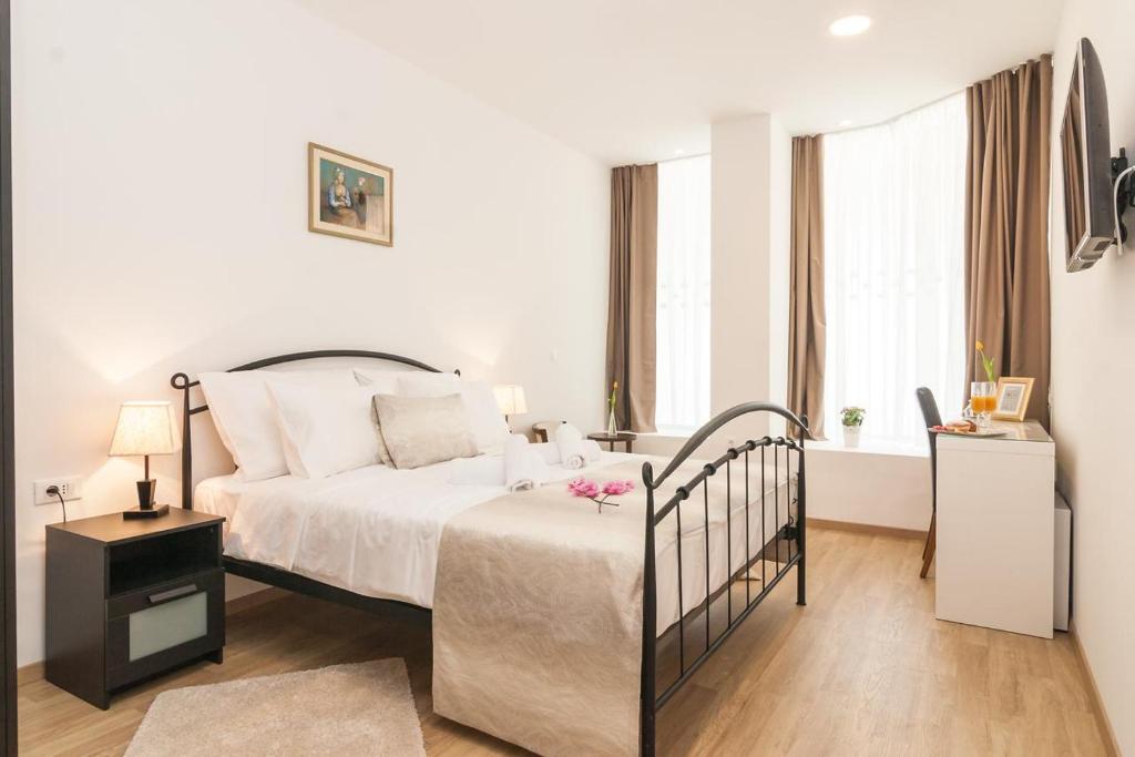 Postel nebo postele na pokoji v ubytování Via Domus
