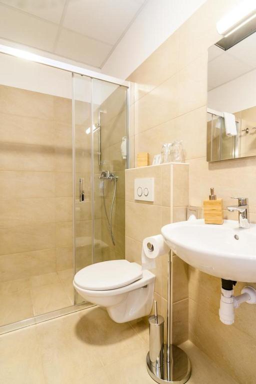 Koupelna v ubytování Via Domus