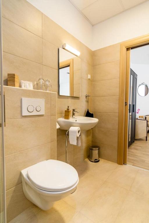 Koupelna v ubytování Via Domus