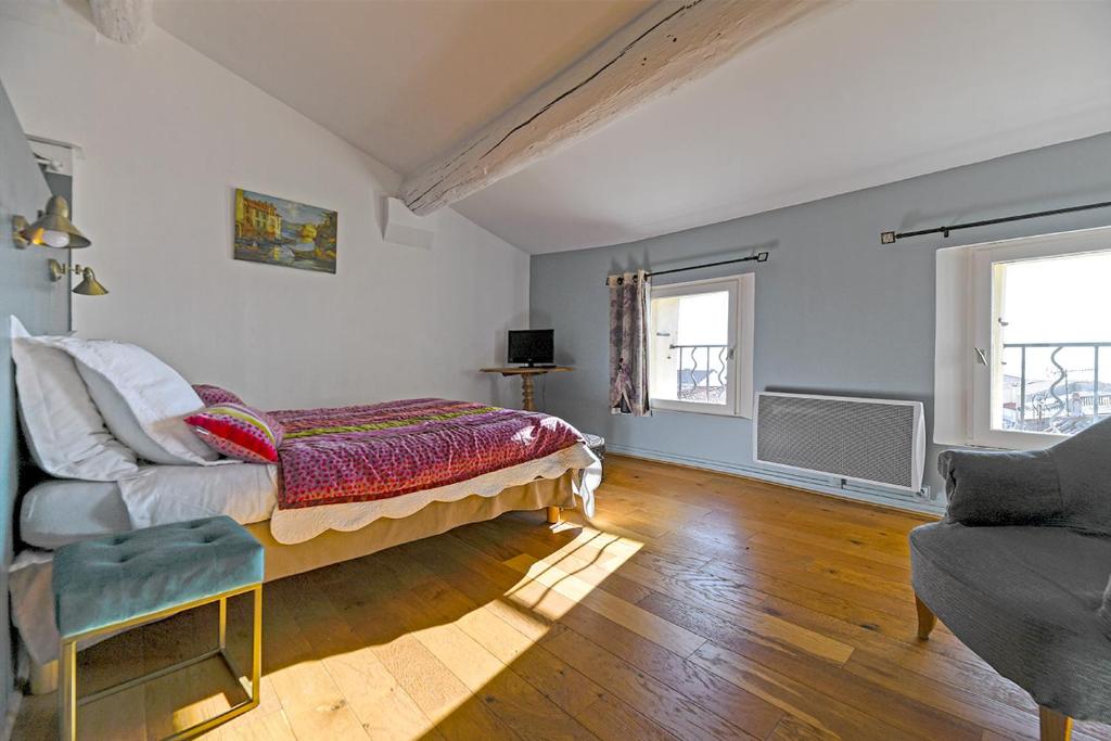 Postel nebo postele na pokoji v ubytování Maison Capucine