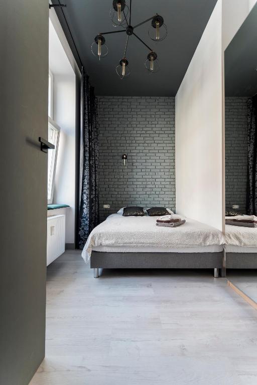 Posteľ alebo postele v izbe v ubytovaní Apartament Centrum Superior