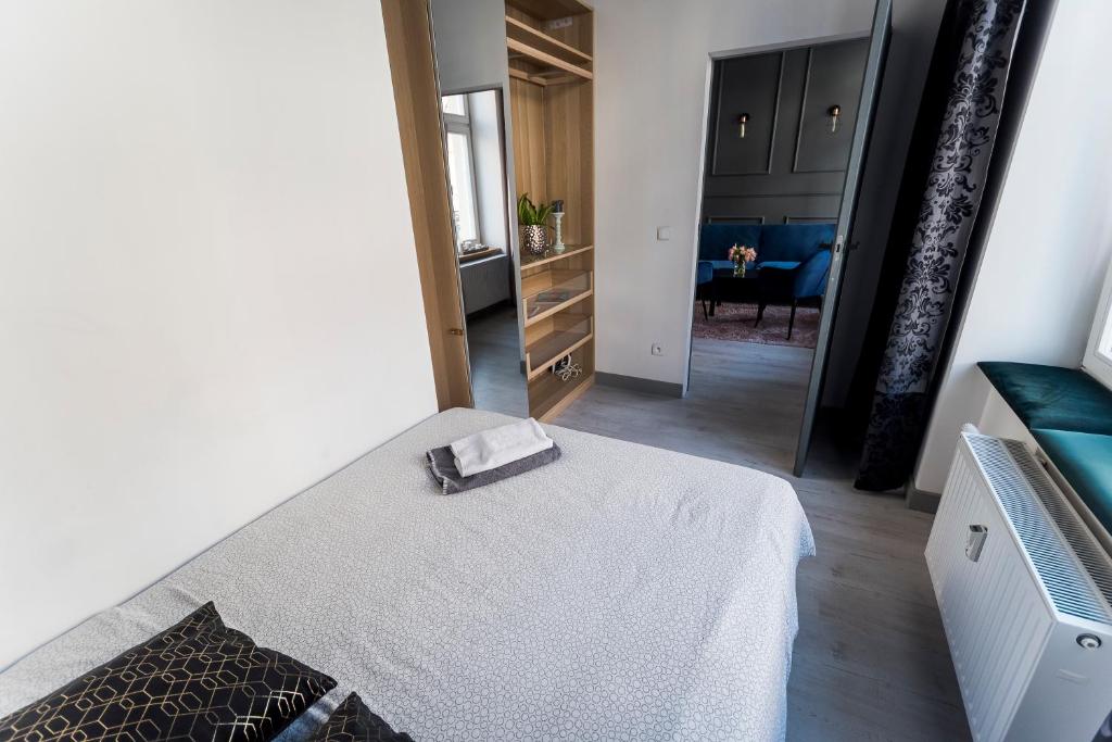 Posteľ alebo postele v izbe v ubytovaní Apartament Centrum Superior