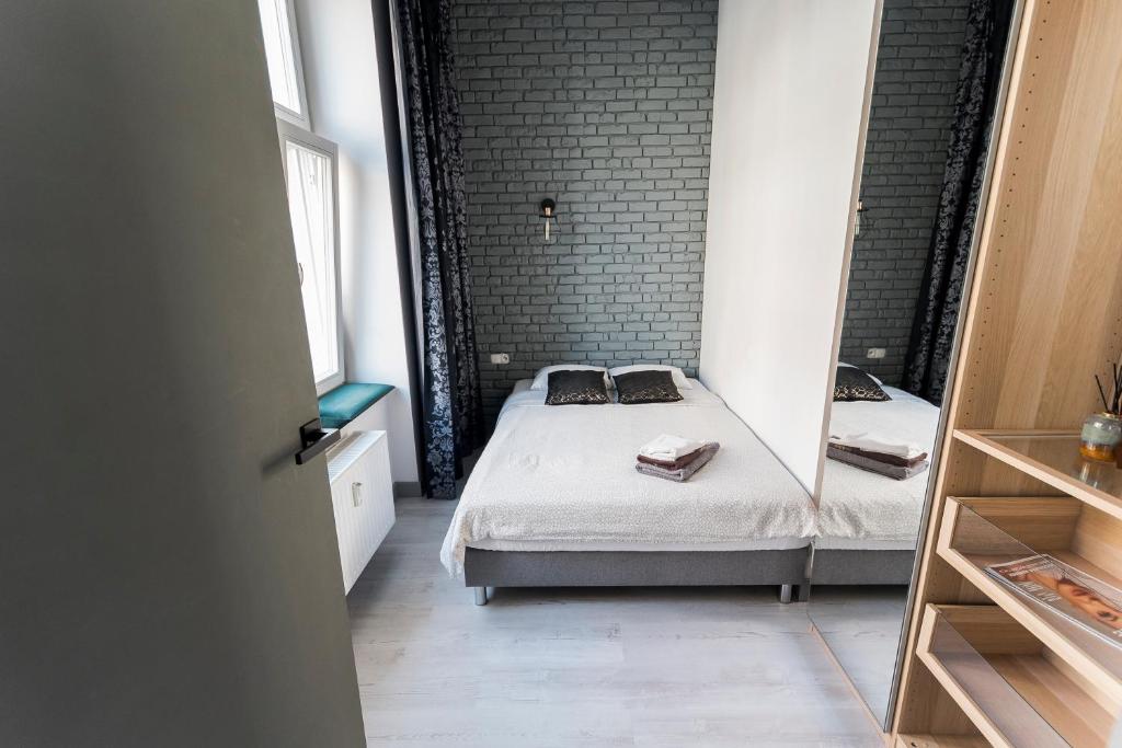 Posteľ alebo postele v izbe v ubytovaní Apartament Centrum Superior