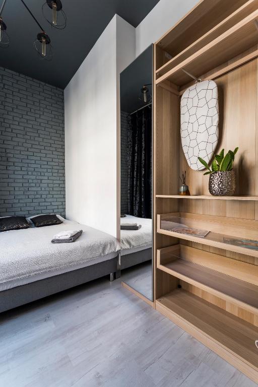 Posteľ alebo postele v izbe v ubytovaní Apartament Centrum Superior