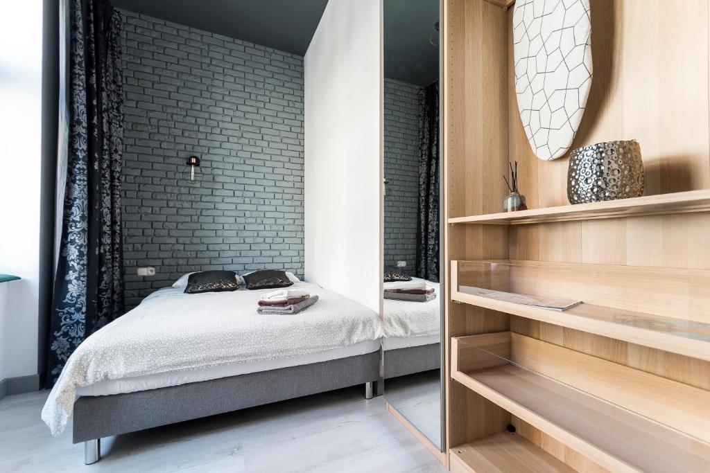 Posteľ alebo postele v izbe v ubytovaní Apartament Centrum Superior