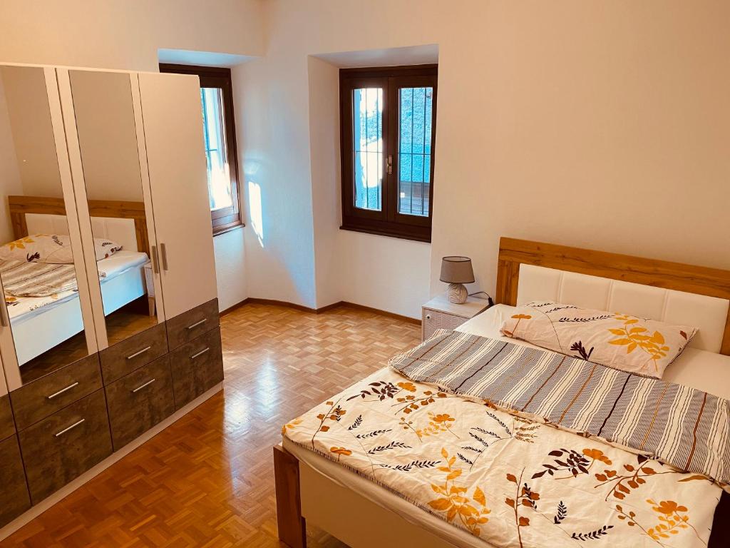 Ein Bett oder Betten in einem Zimmer der Unterkunft Appartamento Soldini