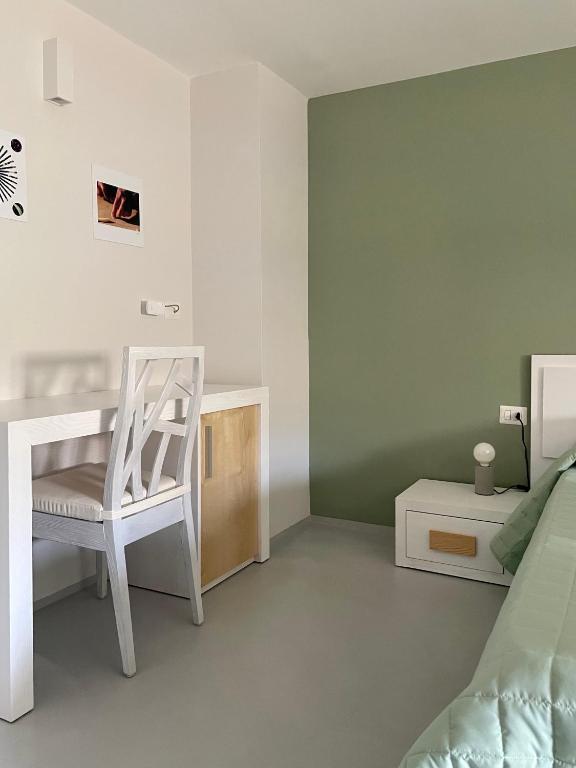 Łóżko lub łóżka w pokoju w obiekcie manzoniquattro