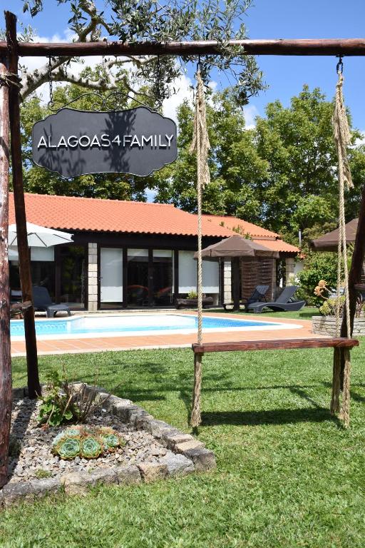 Um jardim no exterior de Alagoas4Family - Country House