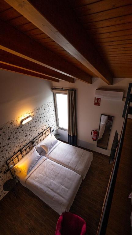 Posteľ alebo postele v izbe v ubytovaní Molino Candeal Hotel Boutique & Apartamentos