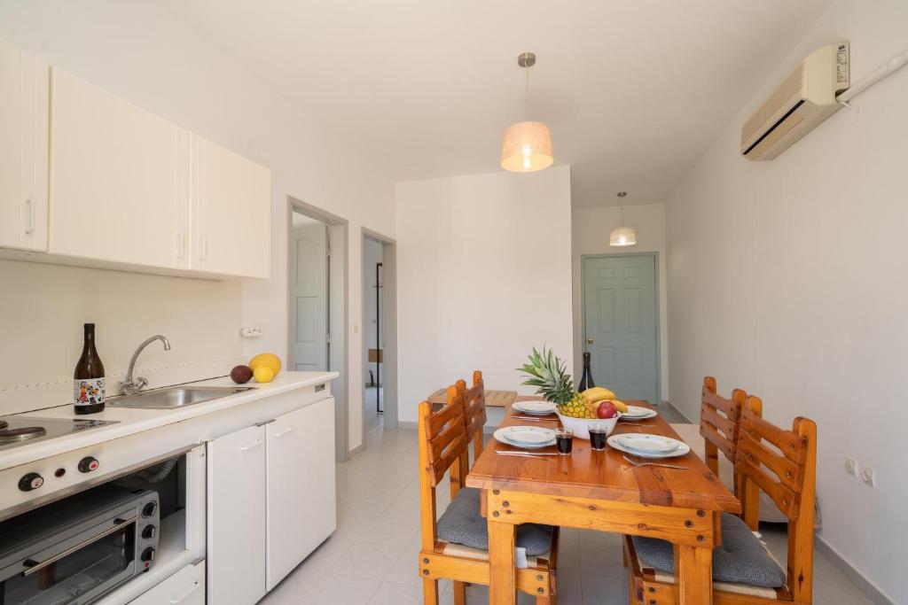 Kuchyň nebo kuchyňský kout v ubytování Iris Apartments