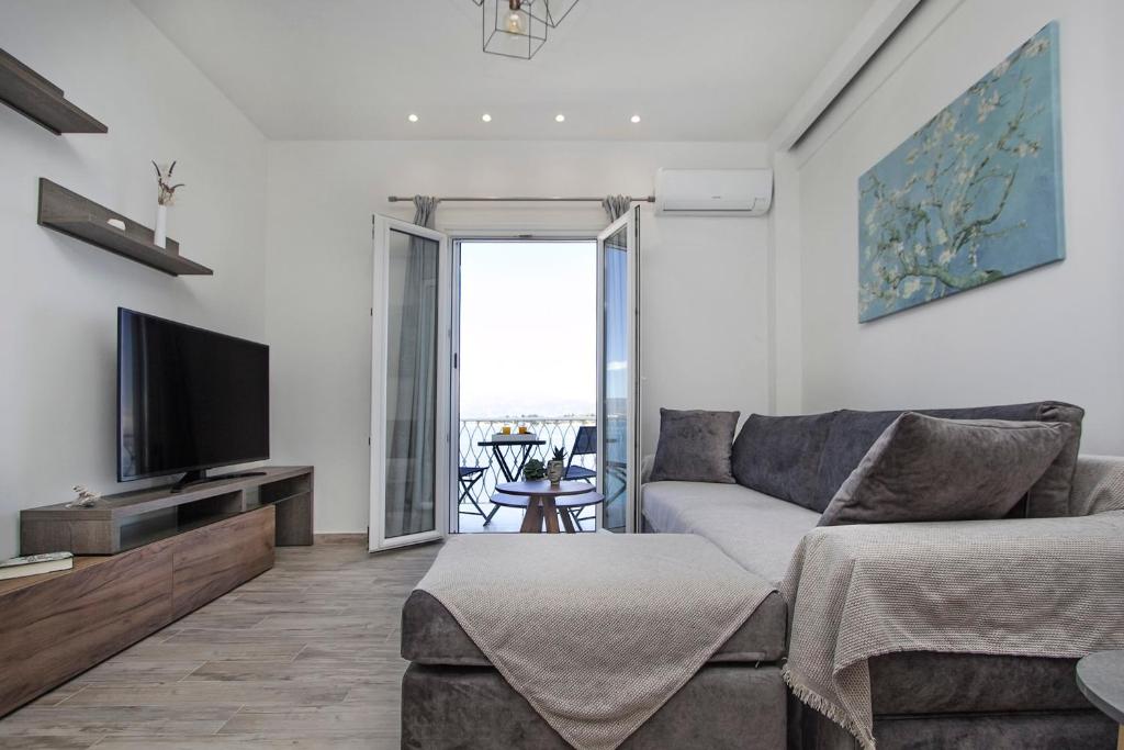 TV a/nebo společenská místnost v ubytování Vidos Seaview Suite