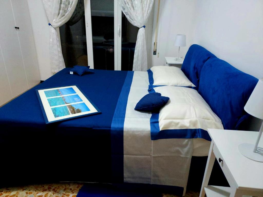 Lova arba lovos apgyvendinimo įstaigoje Casa Cornice