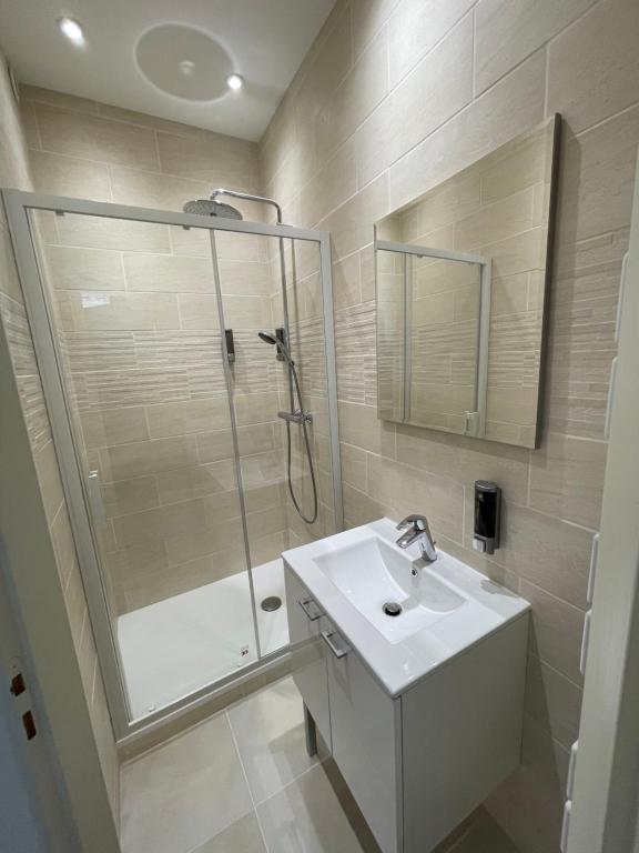 a bathroom with a shower and a sink and a shower at Studio 11 Panier Vieux Port Roof Top in Marseille