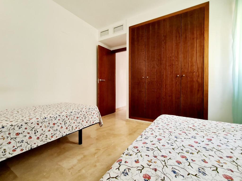 Posteľ alebo postele v izbe v ubytovaní Punta Prima Modern, 100 m sea, 2 swimming-pools, aircondition, Free WI-FI