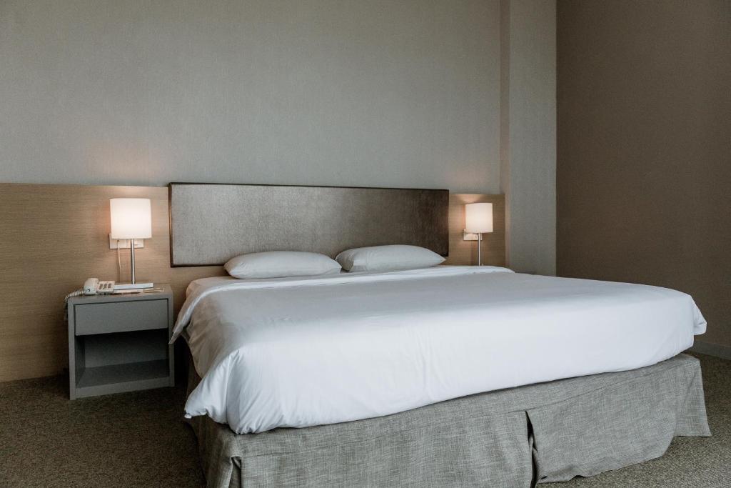 Postel nebo postele na pokoji v ubytování Hotel N°5