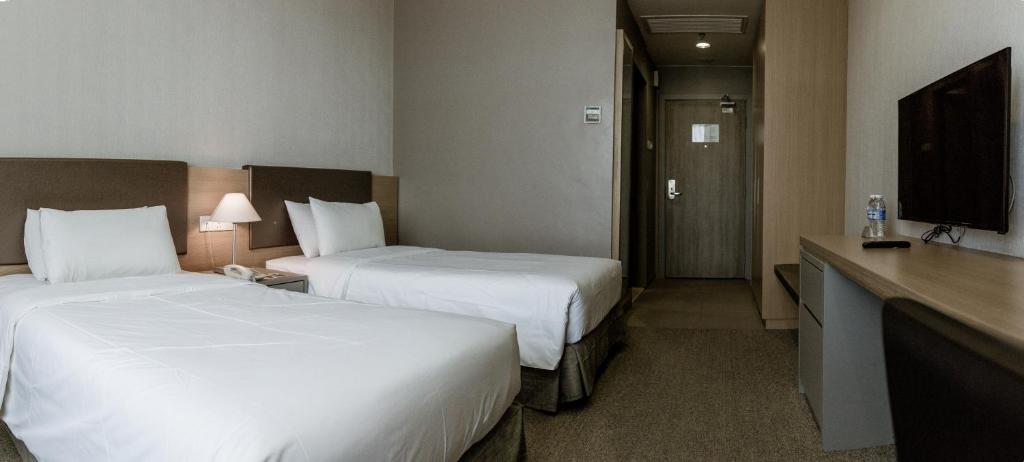 Postel nebo postele na pokoji v ubytování Hotel N°5