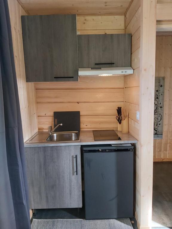 Kuchyň nebo kuchyňský kout v ubytování Timaro