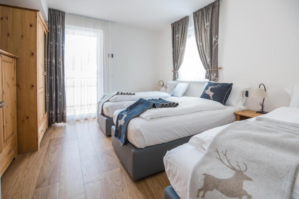 Postel nebo postele na pokoji v ubytování Piccola Cesa B&B