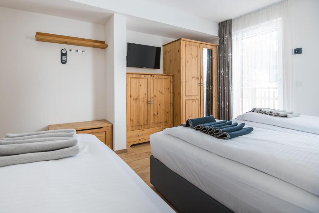 Postel nebo postele na pokoji v ubytování Piccola Cesa B&B
