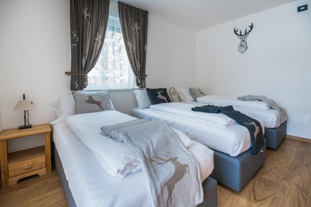 Postel nebo postele na pokoji v ubytování Piccola Cesa B&B