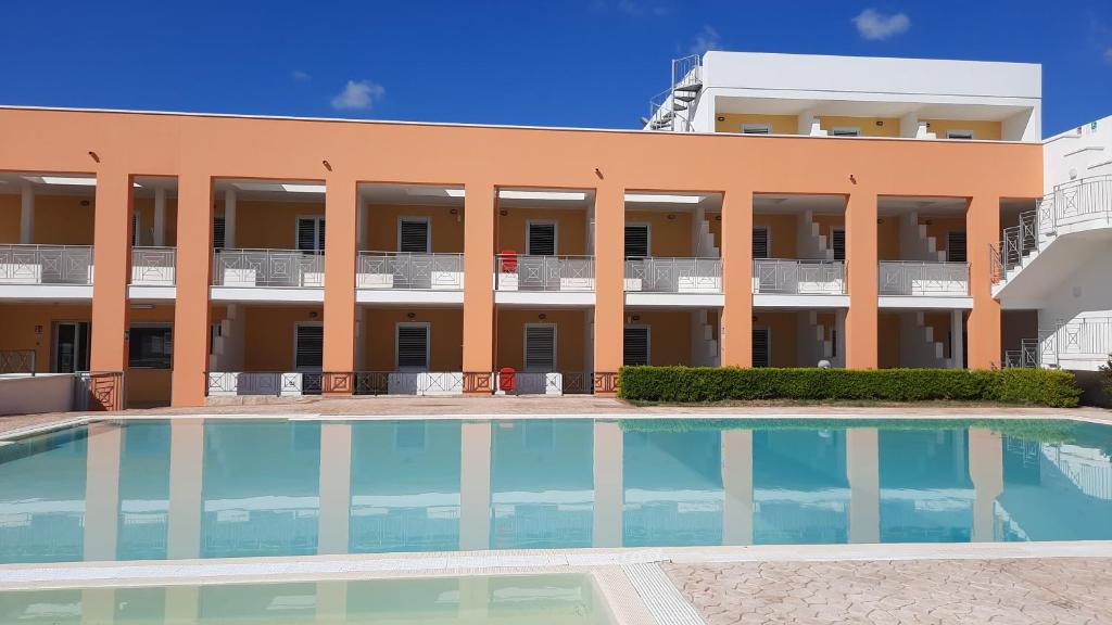 Bazén v ubytování Residence Solaris nebo v jeho okolí