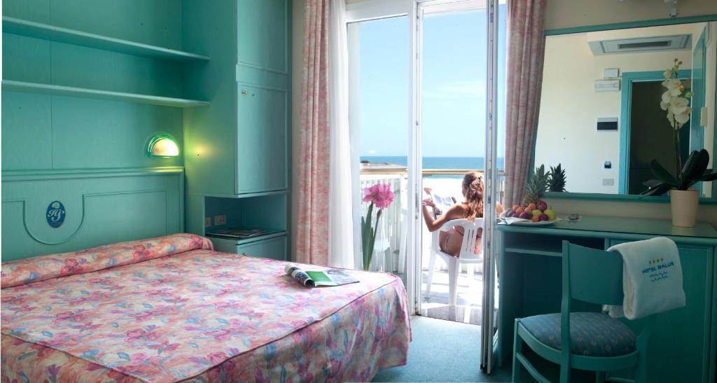 Postel nebo postele na pokoji v ubytování Salus Smart & Chic Hotel