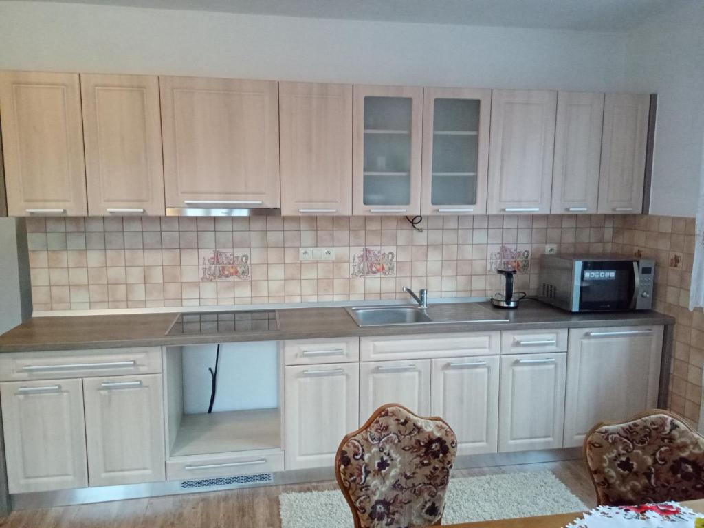 Kuchyň nebo kuchyňský kout v ubytování Apartmány Tonka 309