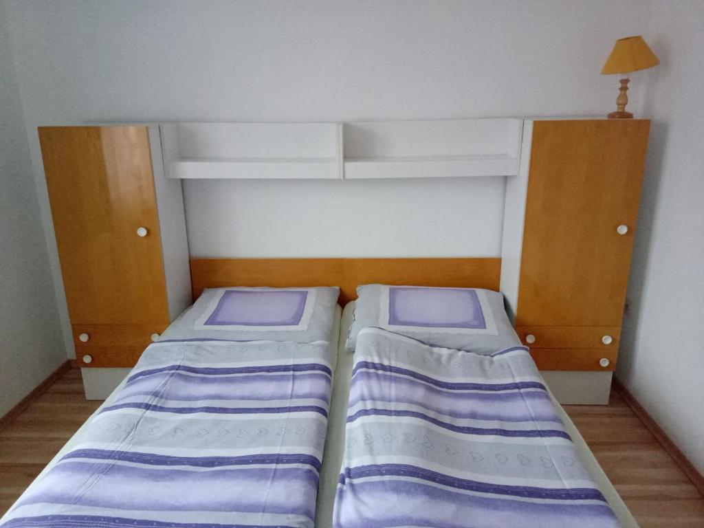 Postel nebo postele na pokoji v ubytování Apartmány Tonka 309