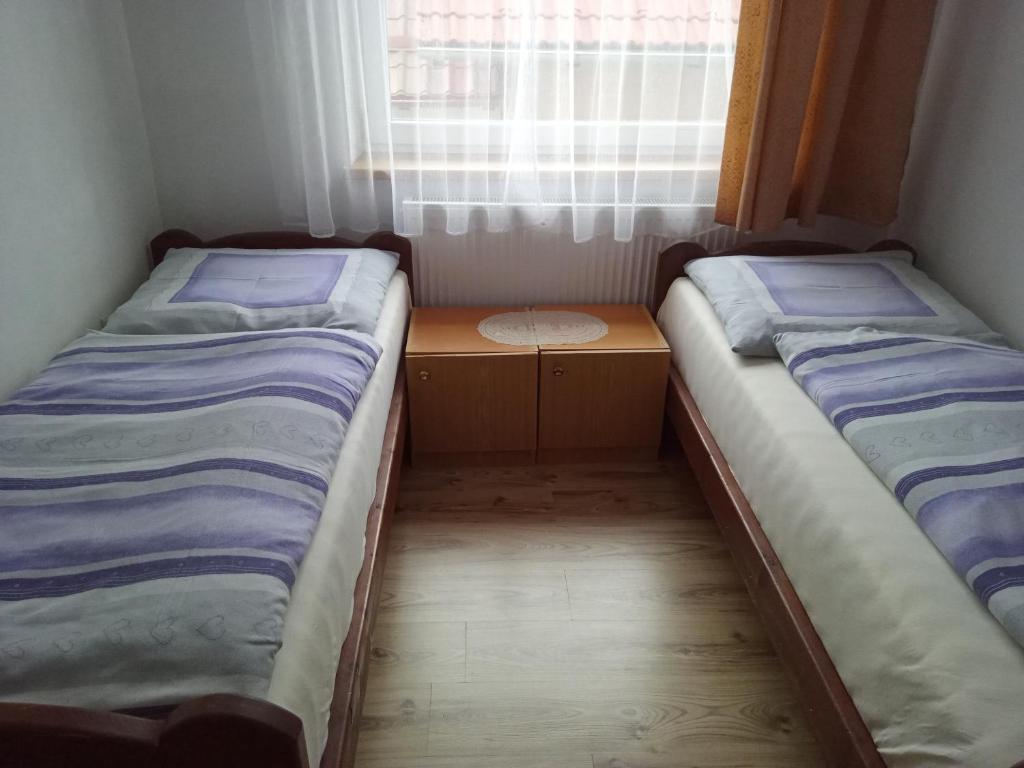 Postel nebo postele na pokoji v ubytování Apartmány Tonka 309