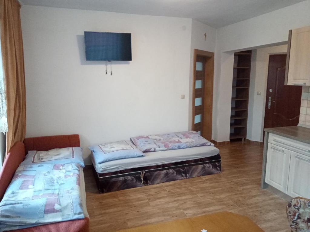 Postel nebo postele na pokoji v ubytování Apartmány Tonka 309